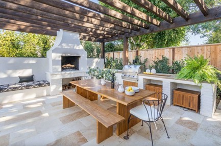 Outdoor brick kitchen and fireplace